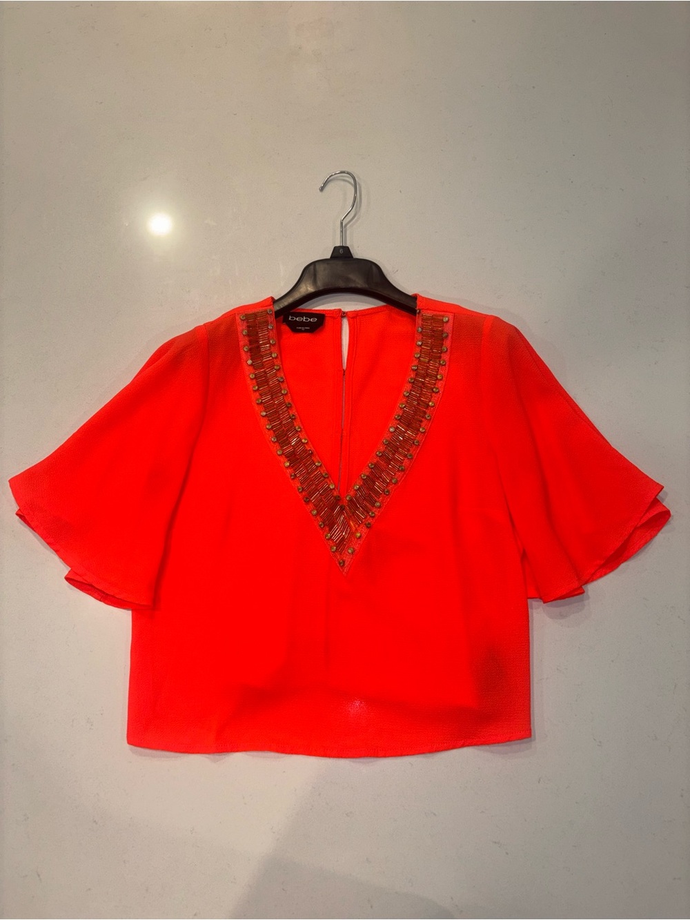 bebe Neon Red V-Neck Beaded Flutter Sleeve Top